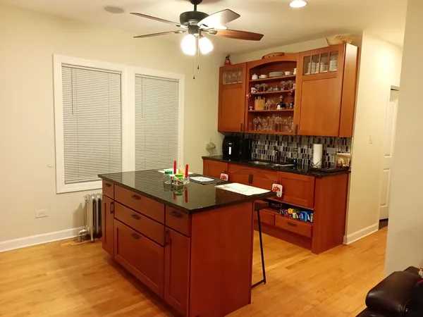 a kitchen with a stove and a microwave