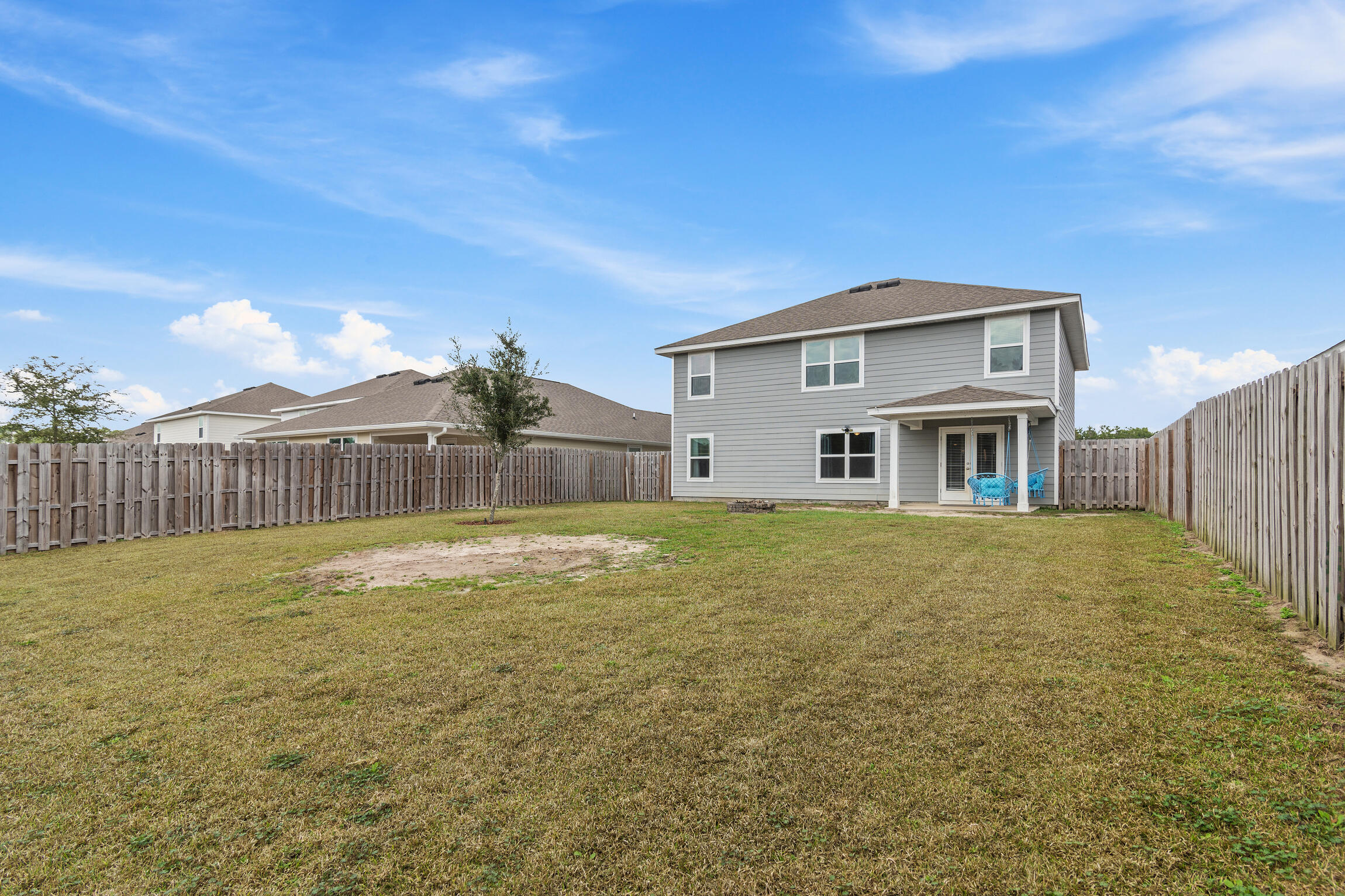 258 This Way, Unit LOT 79 Freeport, FL 32439 - Photo 14 of 80 a view of a house with backyard and wooden fence