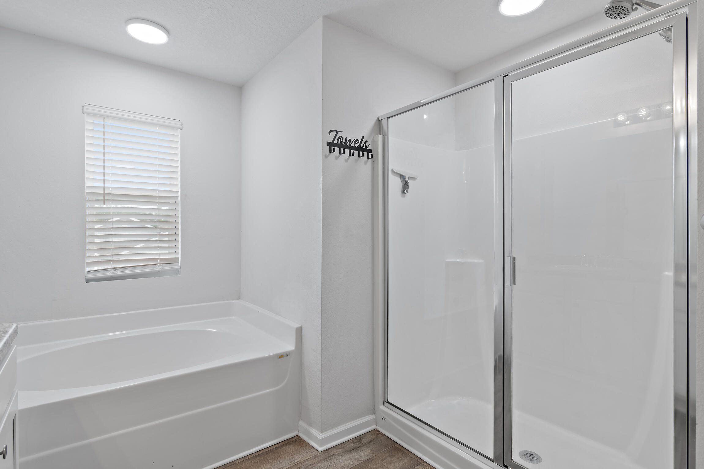 258 This Way, Unit LOT 79 Freeport, FL 32439 - Photo 23 of 80 a bathroom with a bathtub and a shower