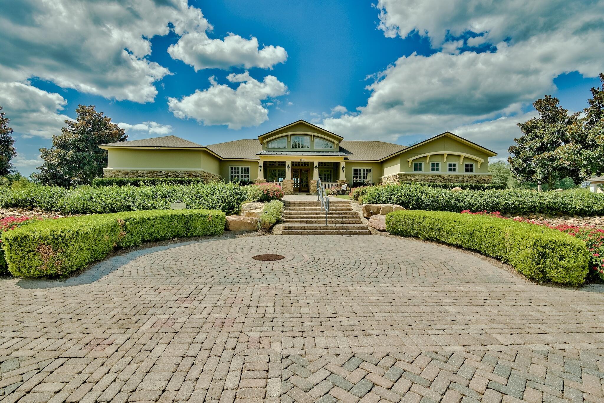 258 This Way, Unit LOT 79 Freeport, FL 32439 - Photo 73 of 80 a front view of a house with a garden