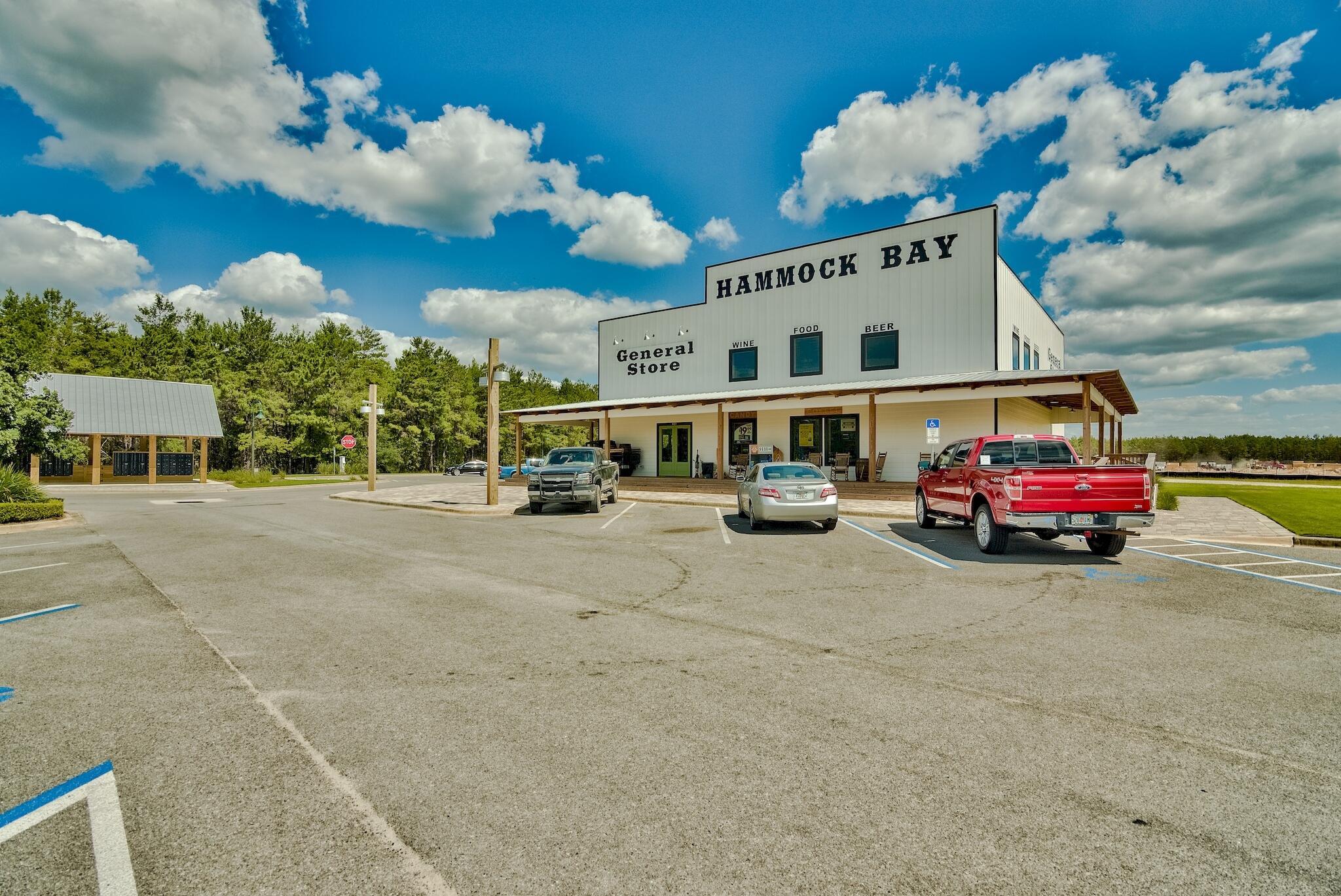 258 This Way, Unit LOT 79 Freeport, FL 32439 - Photo 75 of 80 a view of a cars park in front of a building