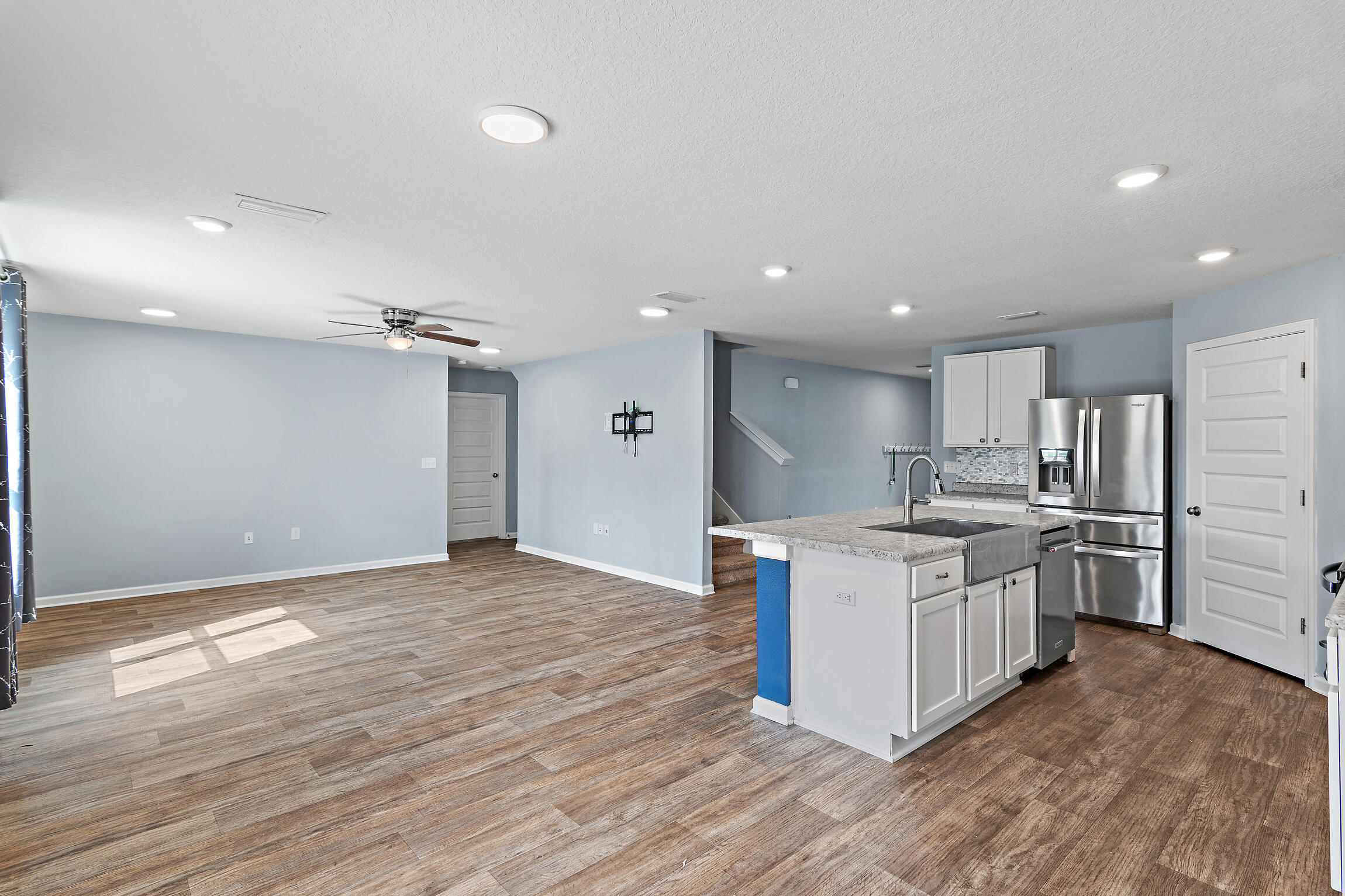 258 This Way, Unit LOT 79 Freeport, FL 32439 - Photo 9 of 80 a kitchen with stainless steel appliances a white stove top oven and cabinets