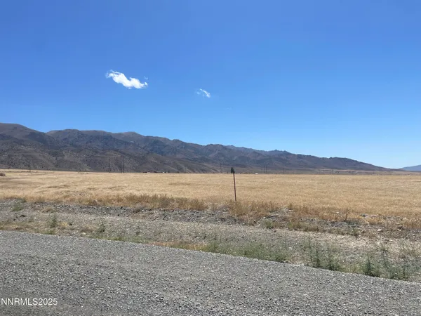 a view of an outdoor space and mountains