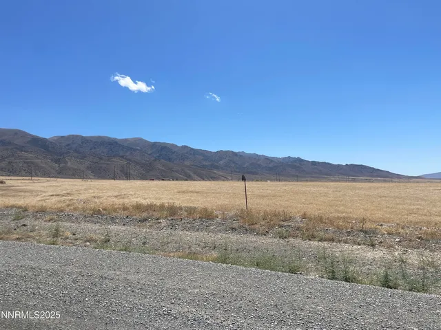 a view of an outdoor space and mountains