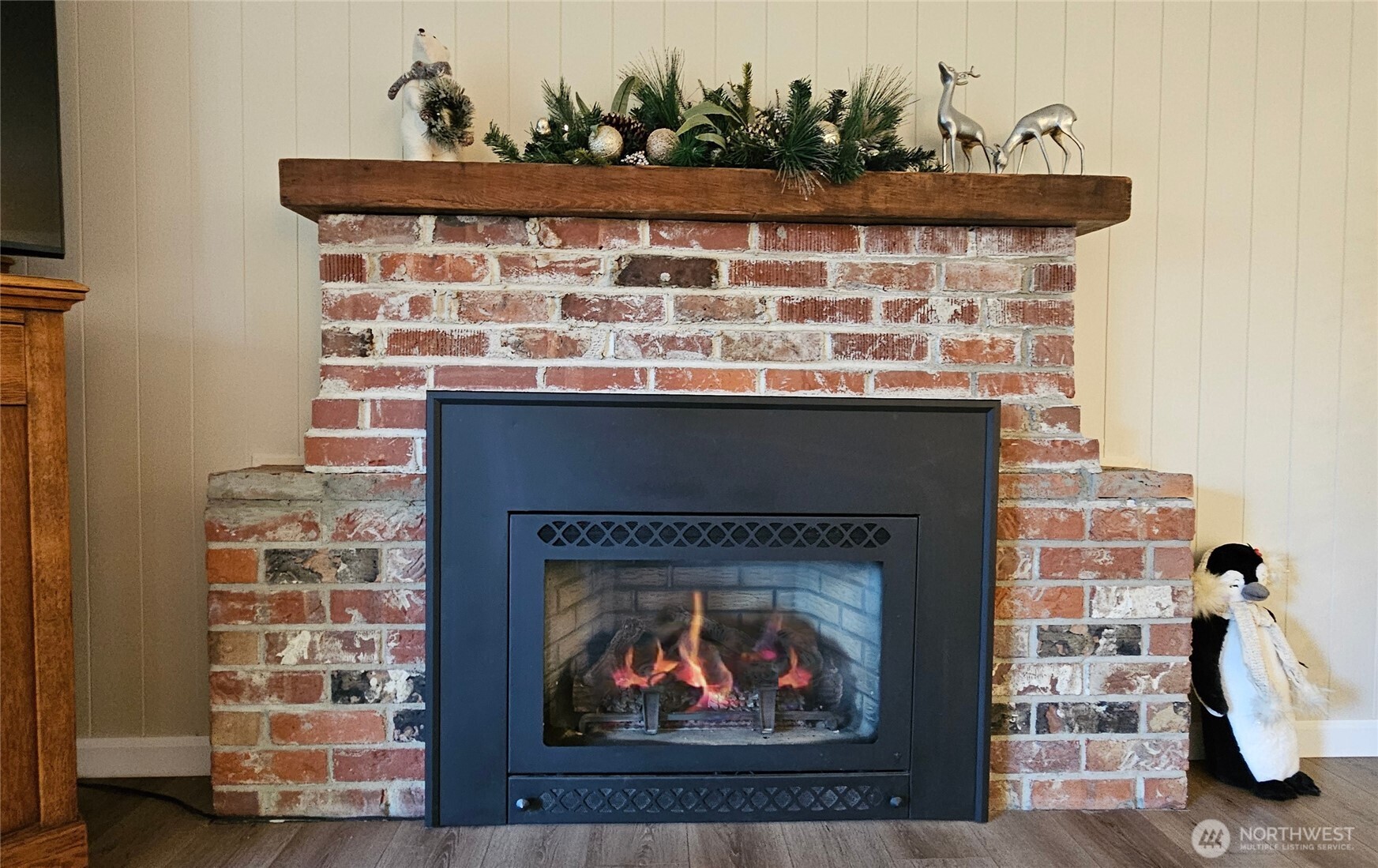 2625 Southwest 320th Place Federal Way, WA 98023 - Photo 12 of 39 a close view of a fireplace with wooden floor
