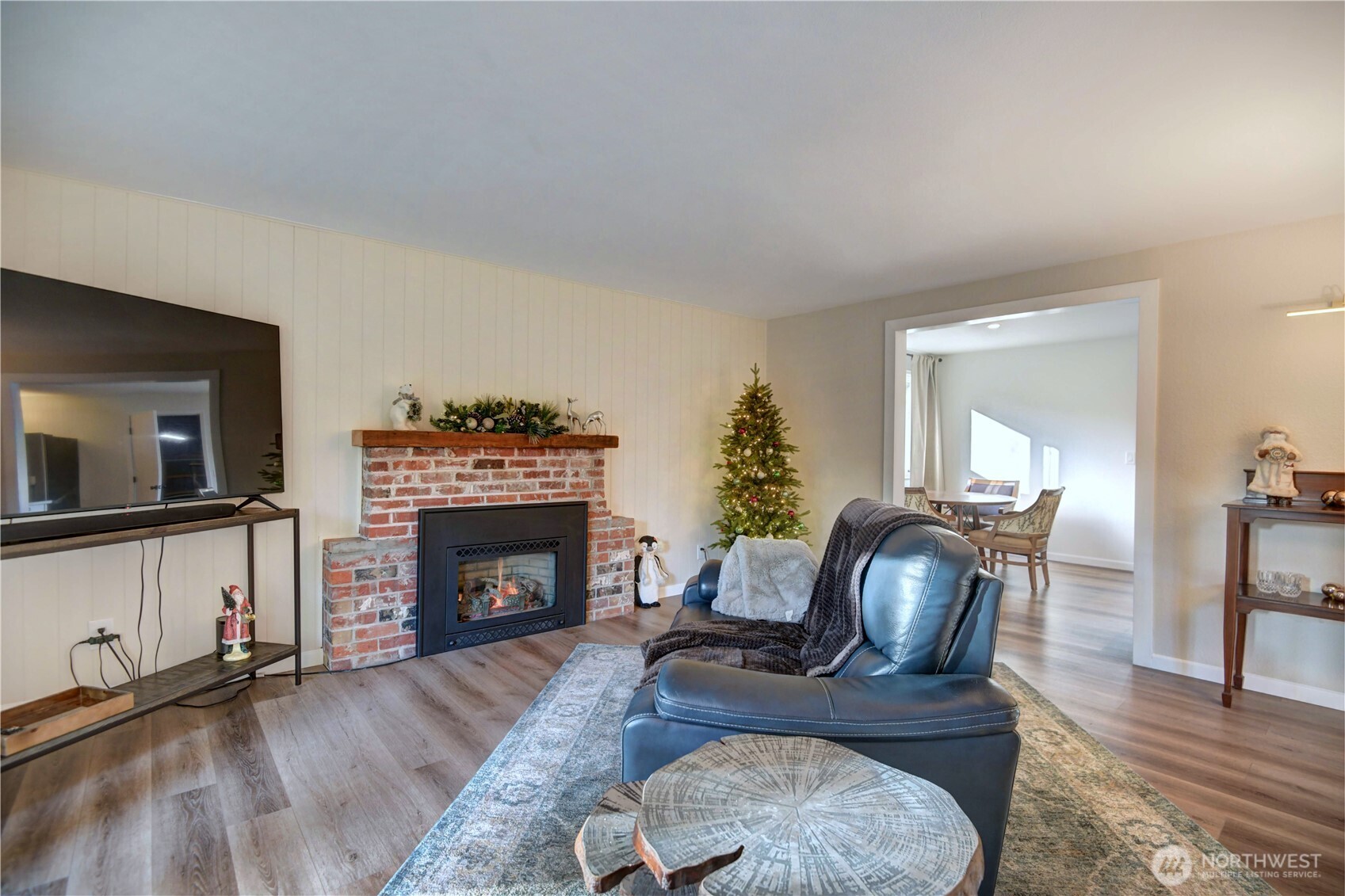 2625 Southwest 320th Place Federal Way, WA 98023 - Photo 17 of 39 a living room with furniture and a fireplace