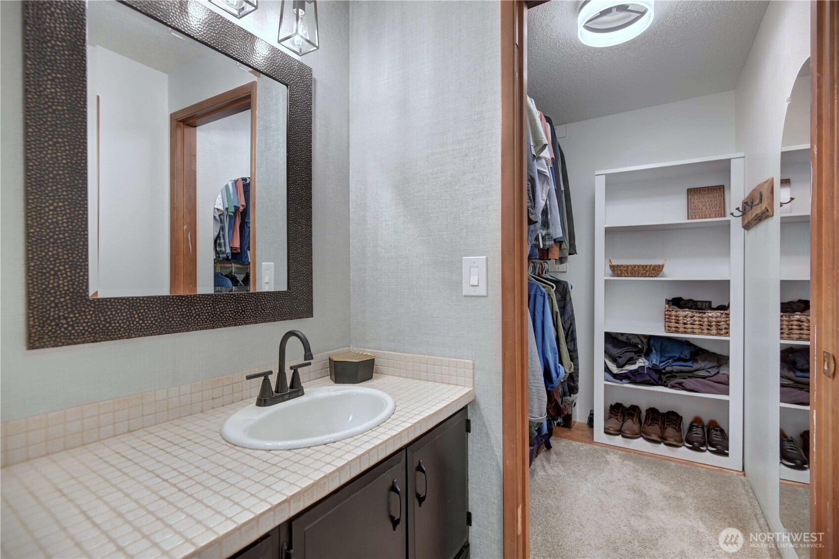 2625 Southwest 320th Place Federal Way, WA 98023 - Photo 18 of 39 a bathroom with a sink and a mirror