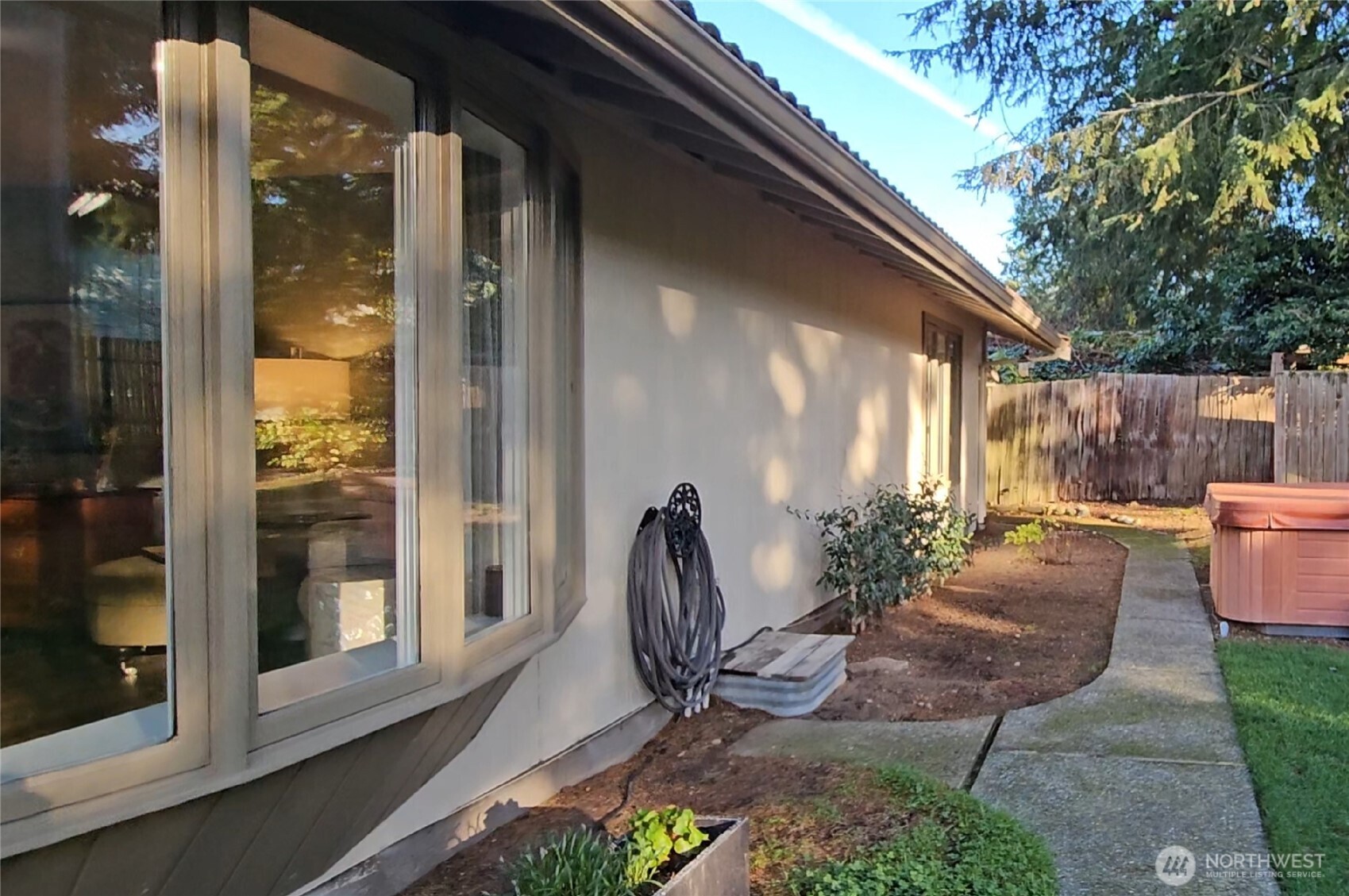 2625 Southwest 320th Place Federal Way, WA 98023 - Photo 27 of 39 a view of a porch with chairs and potted plants