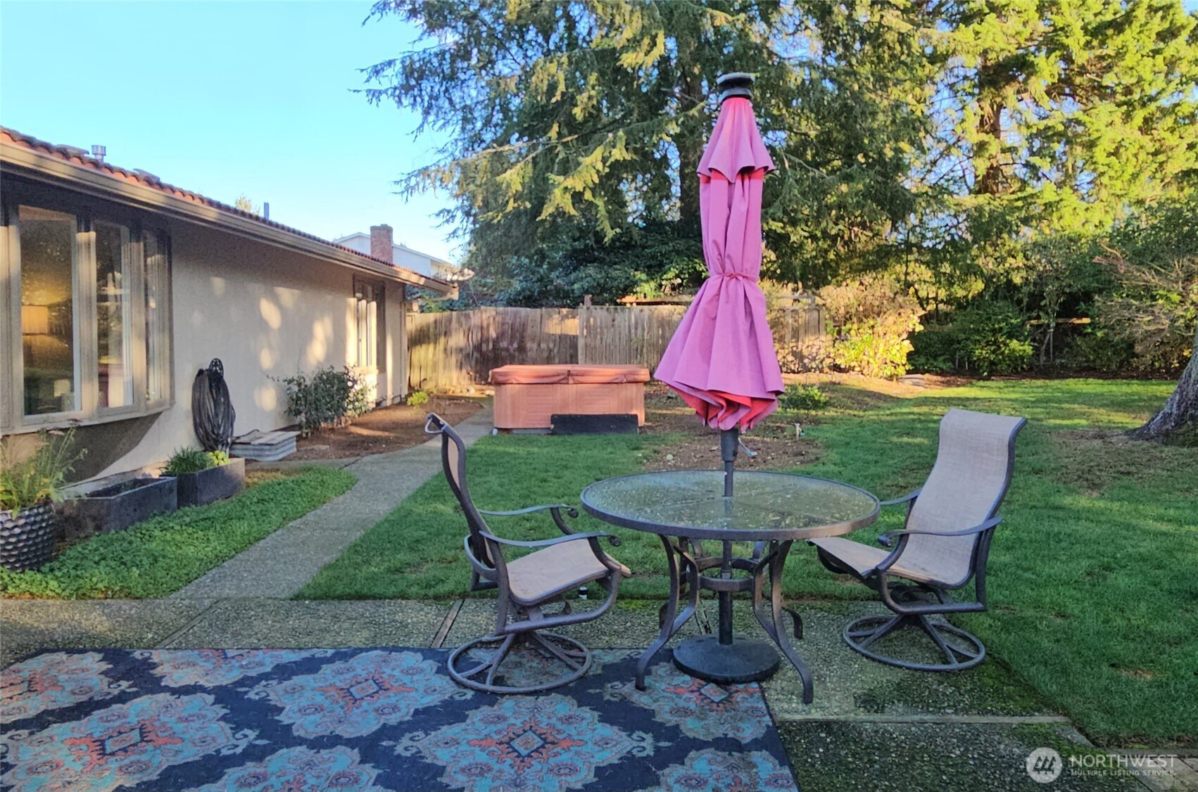2625 Southwest 320th Place Federal Way, WA 98023 - Photo 28 of 39 a backyard of a house with table and chairs