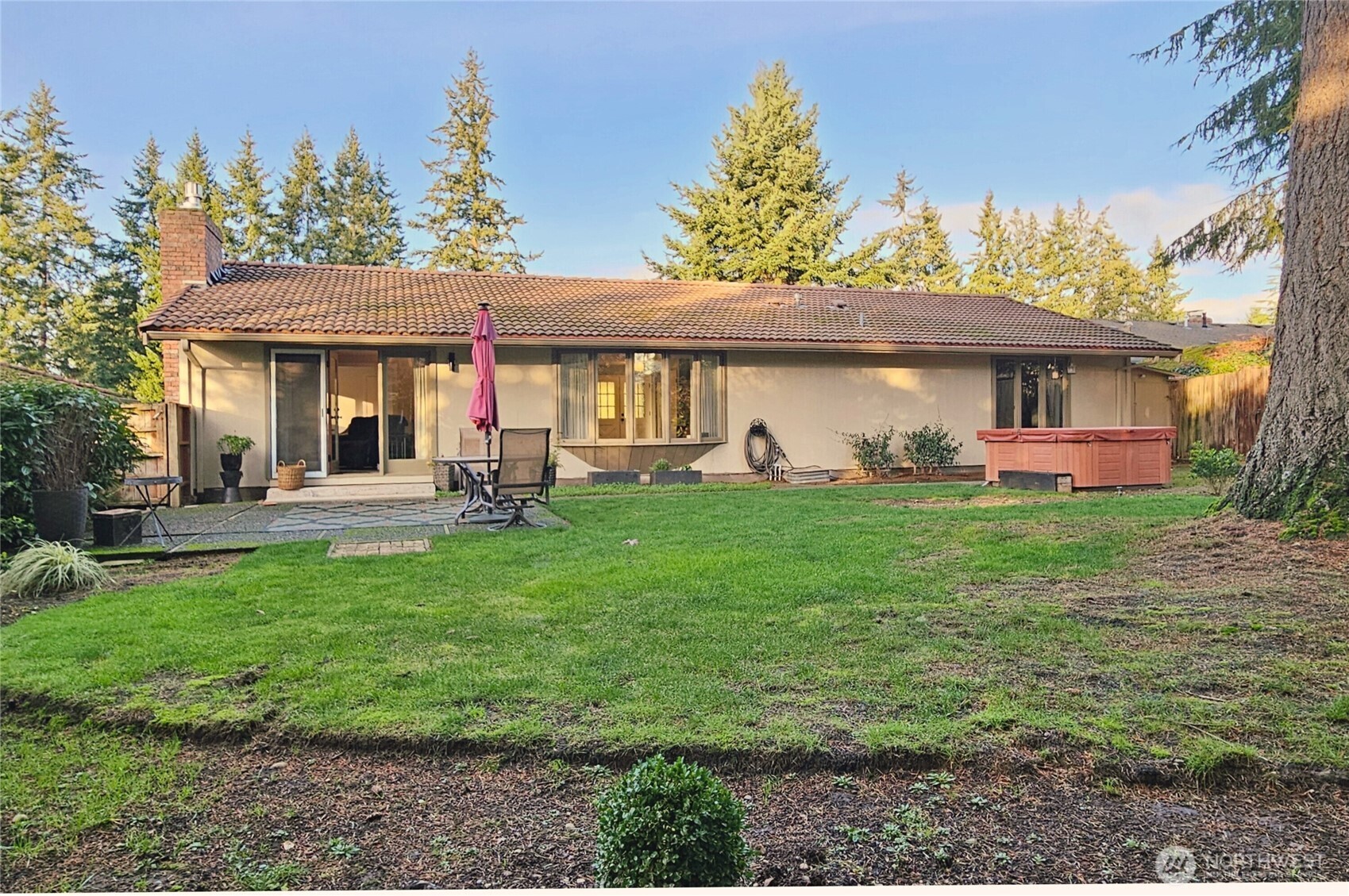 2625 Southwest 320th Place Federal Way, WA 98023 - Photo 29 of 39 a view of a house with backyard sitting area and garden