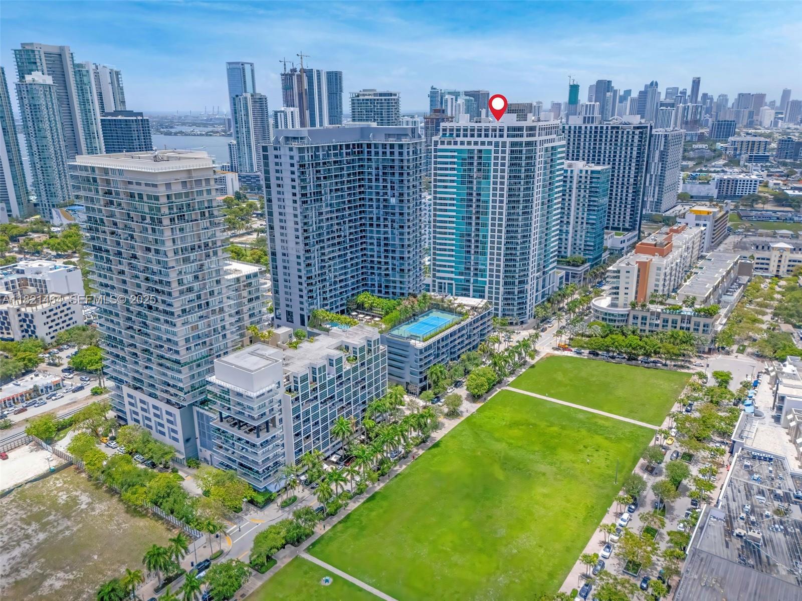 Midtown Miami Miami, FL 33137 - Photo 16 of 17 a view of a city with tall buildings