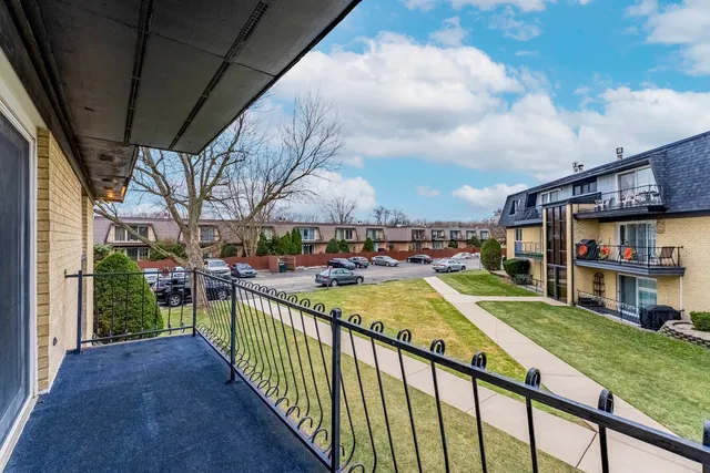 a view of a swimming pool with a porch