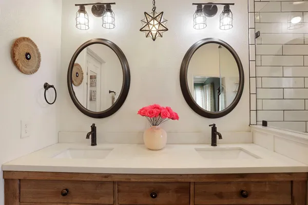 a bathroom with a sink and shower
