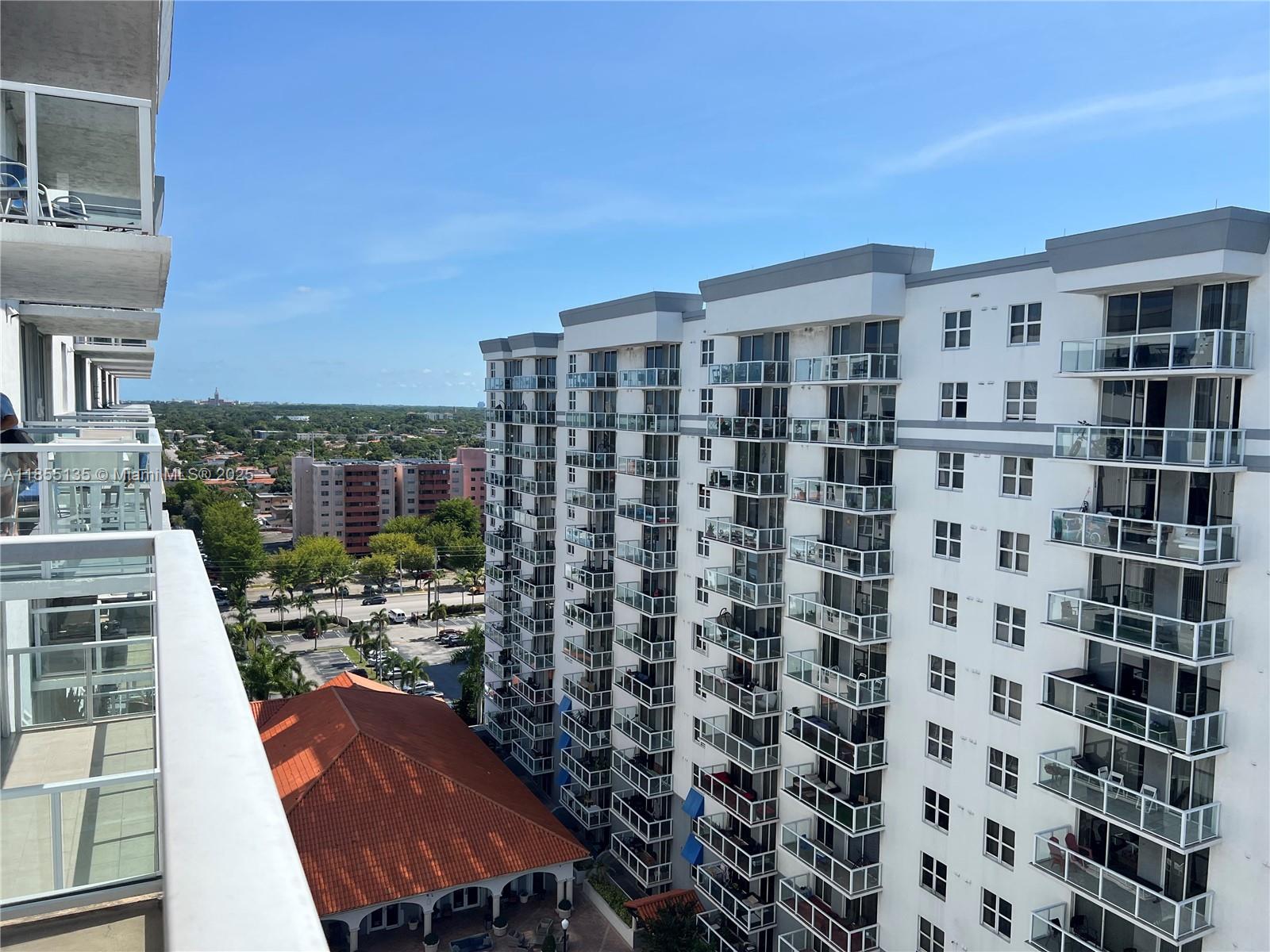 5077 Northwest 7th Street, Unit PH4 Miami, FL 33126 - Photo 2 of 25 a view of a city with tall buildings