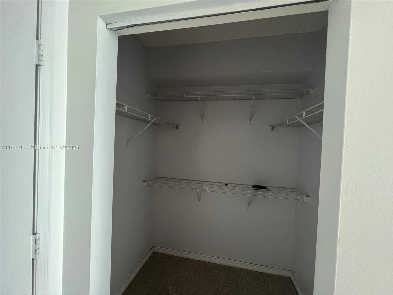 5077 Northwest 7th Street, Unit PH4 Miami, FL 33126 - Photo 10 of 25 a view of closet