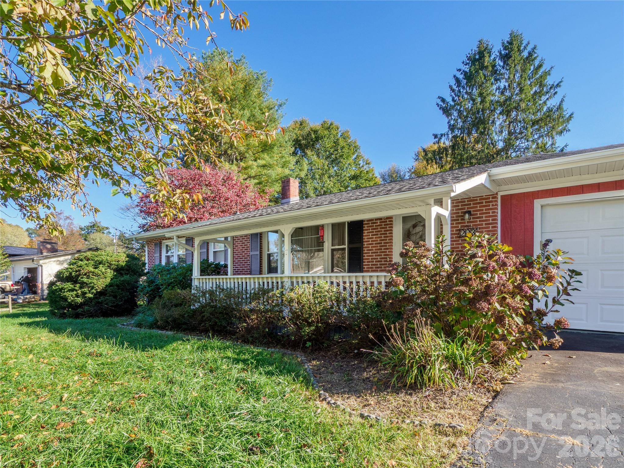 203 Oak Grove Road East Flat Rock, NC 28726 - Photo 23 of 24 a front view of house with yard and green space
