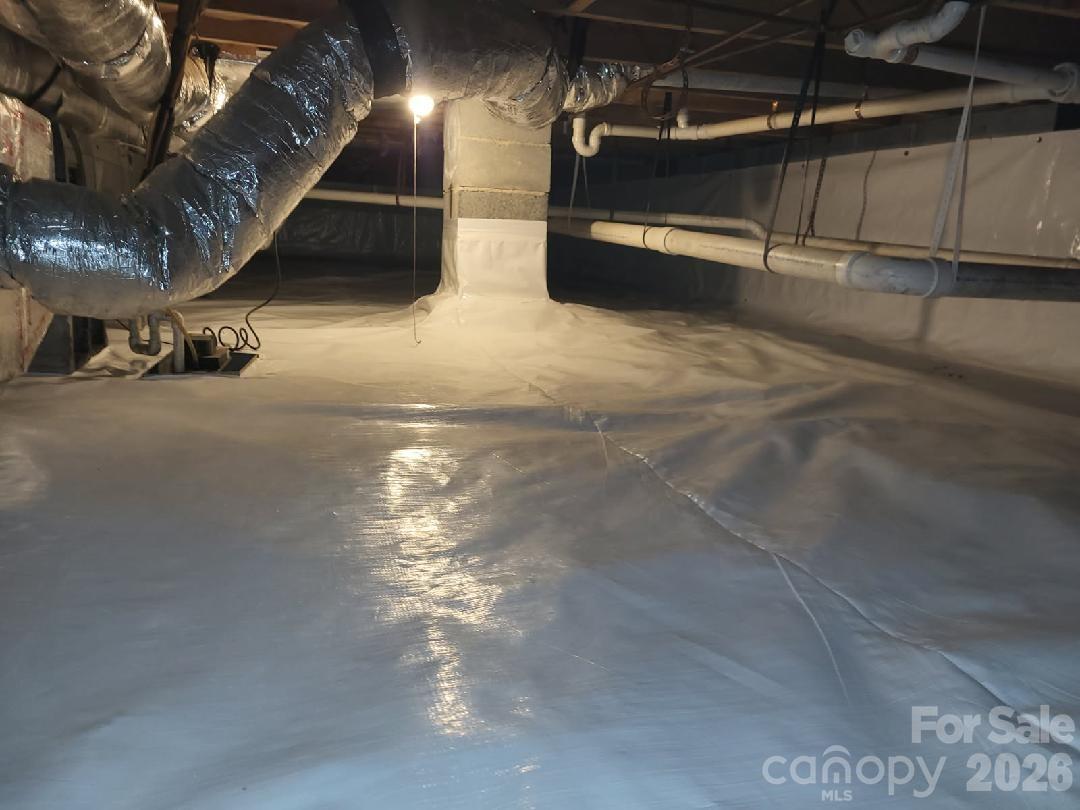 203 Oak Grove Road East Flat Rock, NC 28726 - Photo 24 of 24 a view of an empty room with stairs