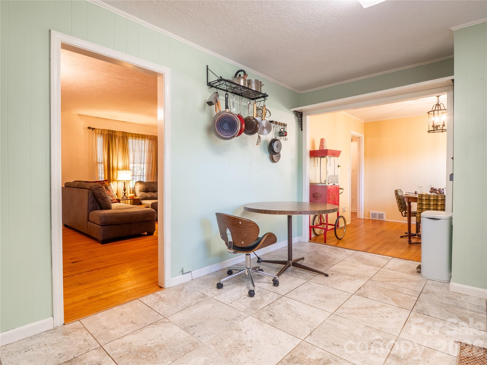 203 Oak Grove Road East Flat Rock, NC 28726 - Photo 7 of 24 a chair and table in a room