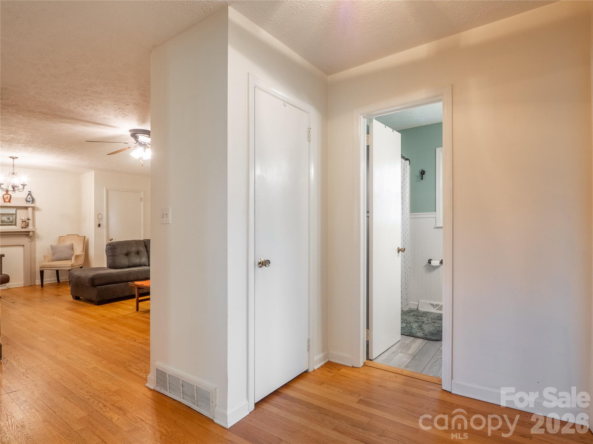 203 Oak Grove Road East Flat Rock, NC 28726 - Photo 8 of 24 a view of a bedroom from the hallway