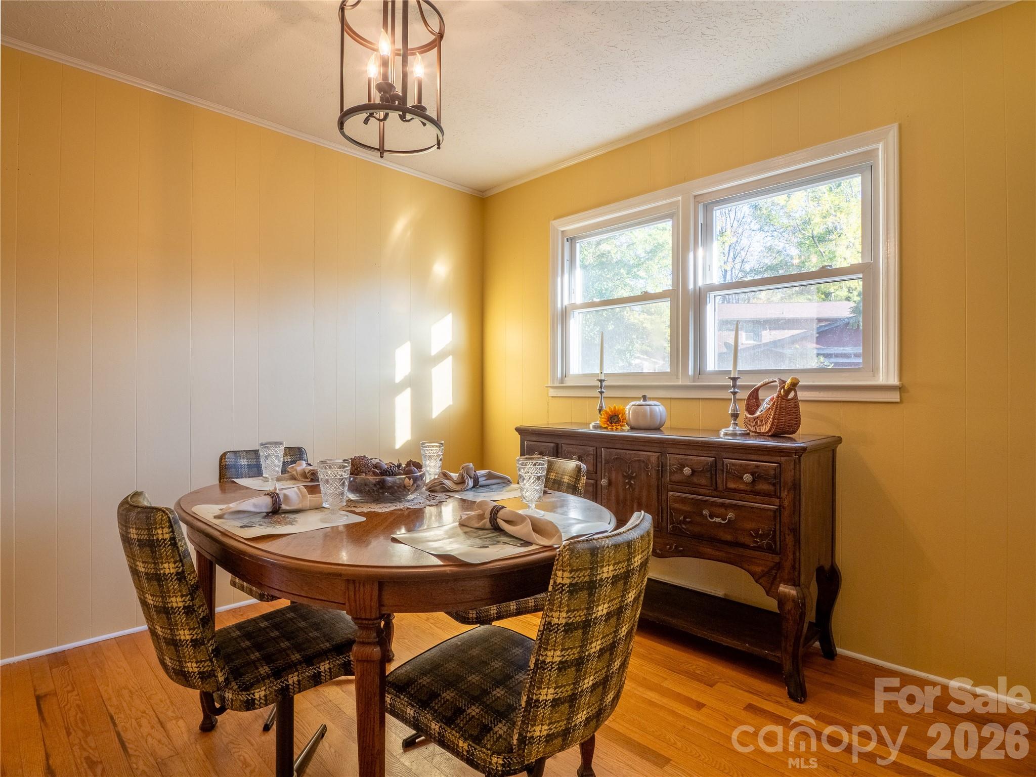 203 Oak Grove Road East Flat Rock, NC 28726 - Photo 10 of 24 a dining room with a table and chairs