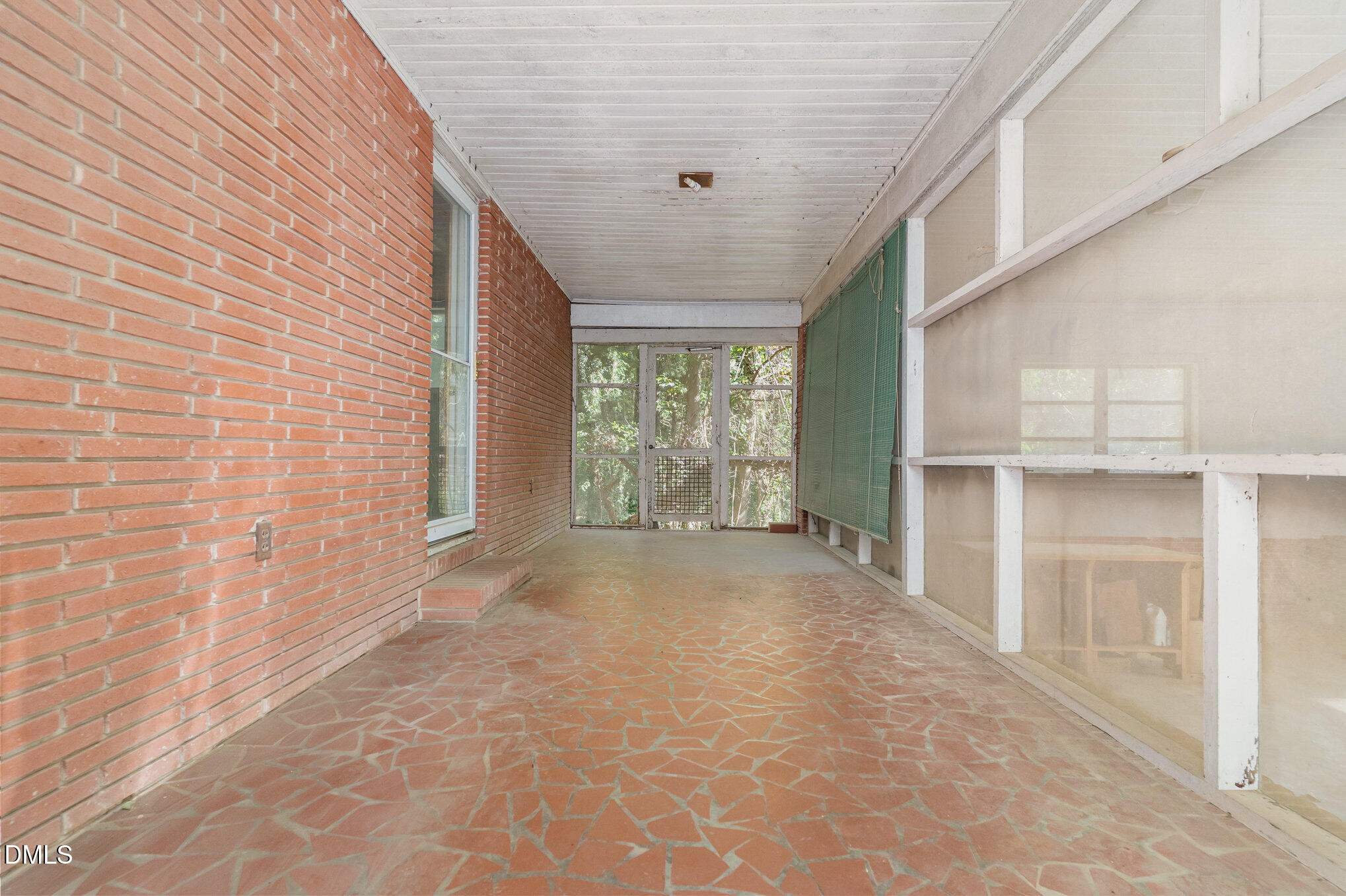 1312 Onslow Road Raleigh, NC 27606 - Photo 19 of 26 a view of an empty room with a window