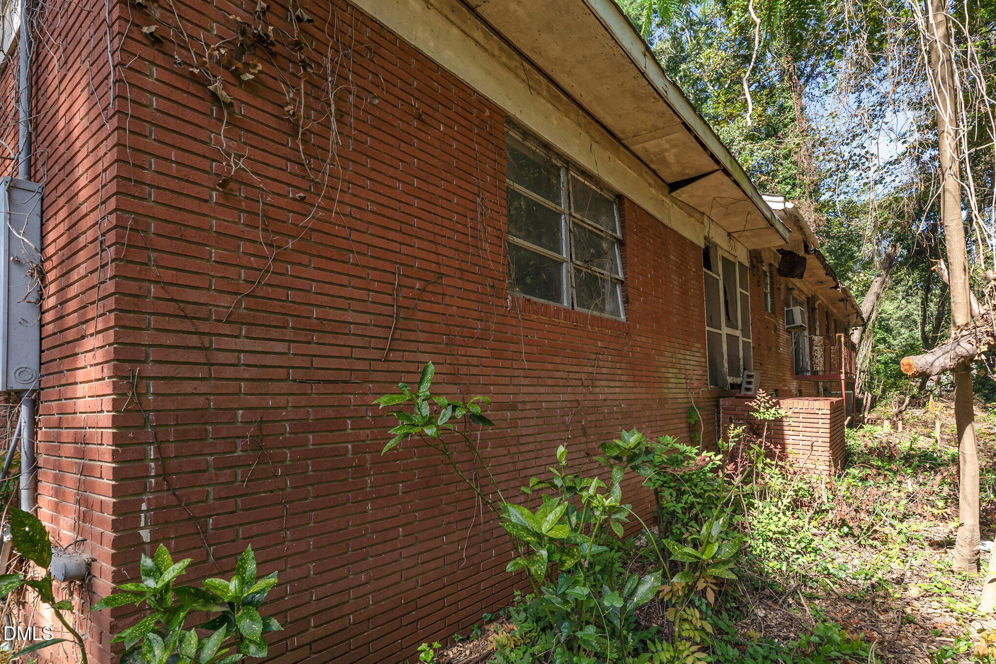 1312 Onslow Road Raleigh, NC 27606 - Photo 20 of 26 a pathway of a house with a yard