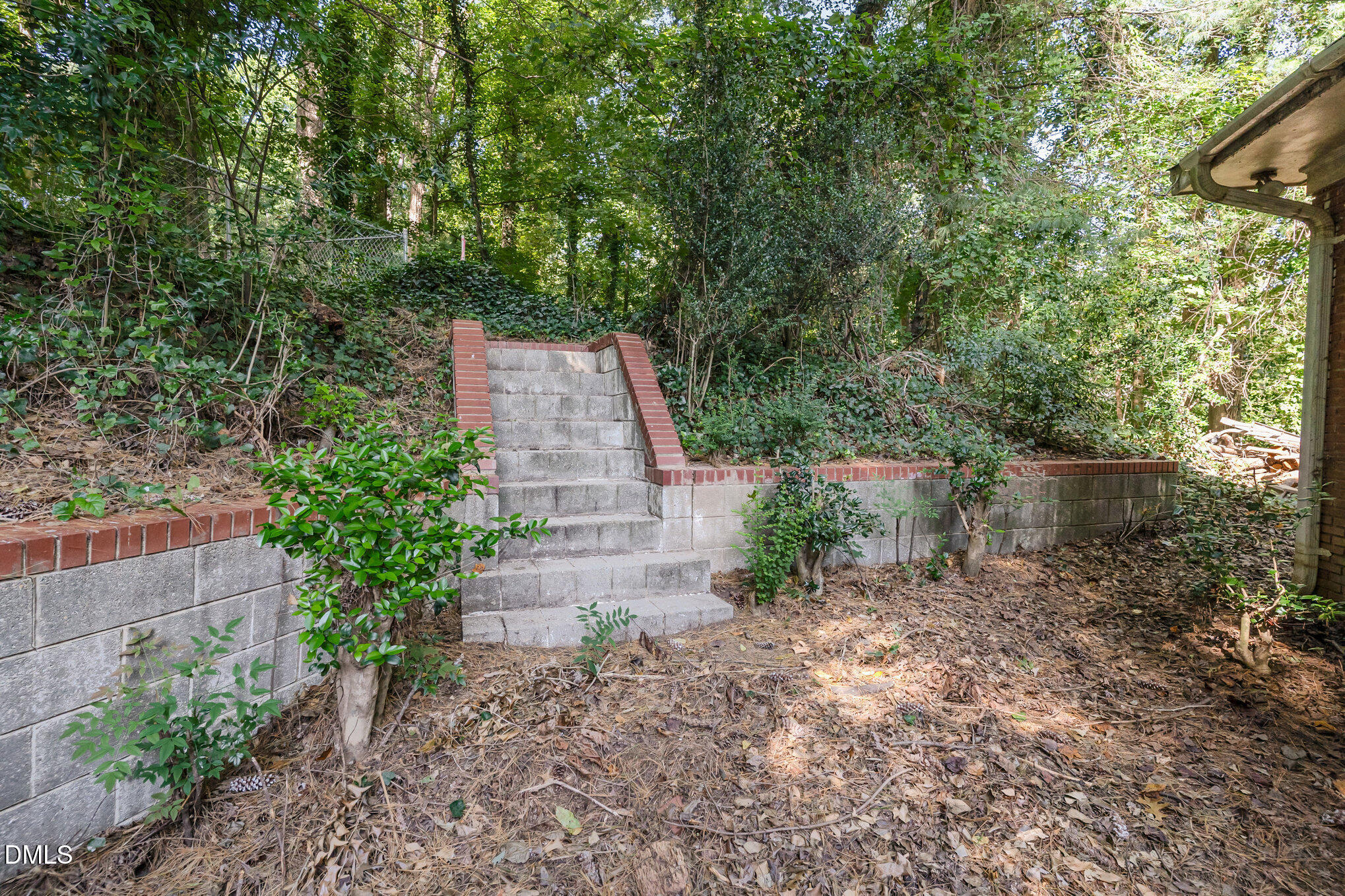 1312 Onslow Road Raleigh, NC 27606 - Photo 22 of 26 a backyard of a house with lots of green space