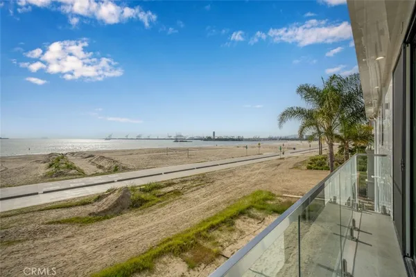 a view of a balcony with an ocean view