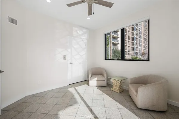 a view of a room with natural light