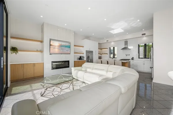 a kitchen with appliances cabinets and furniture