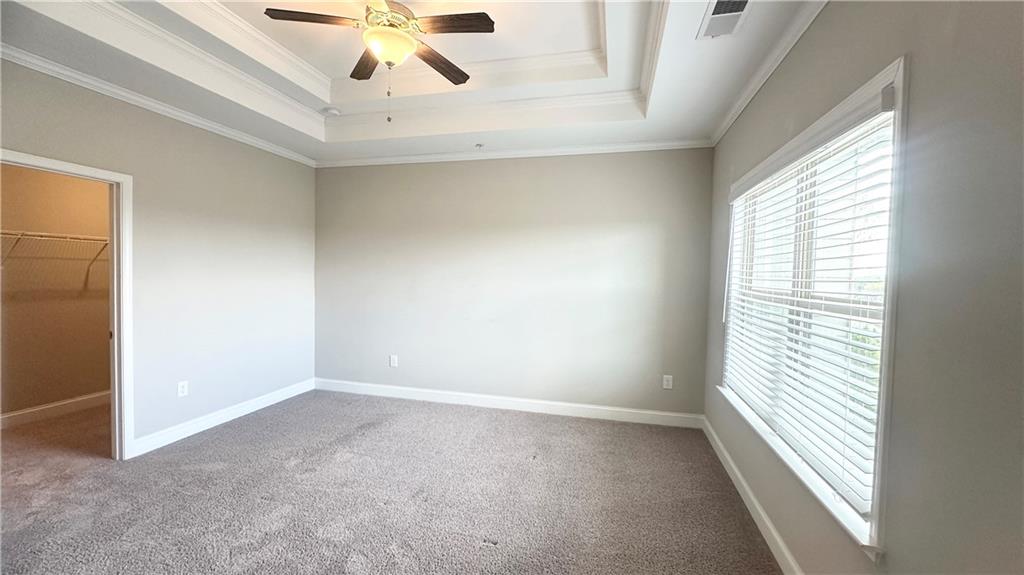 3092 Quantum Lane Atlanta, GA 30341 - Photo 30 of 44 an empty room with a window and a fan