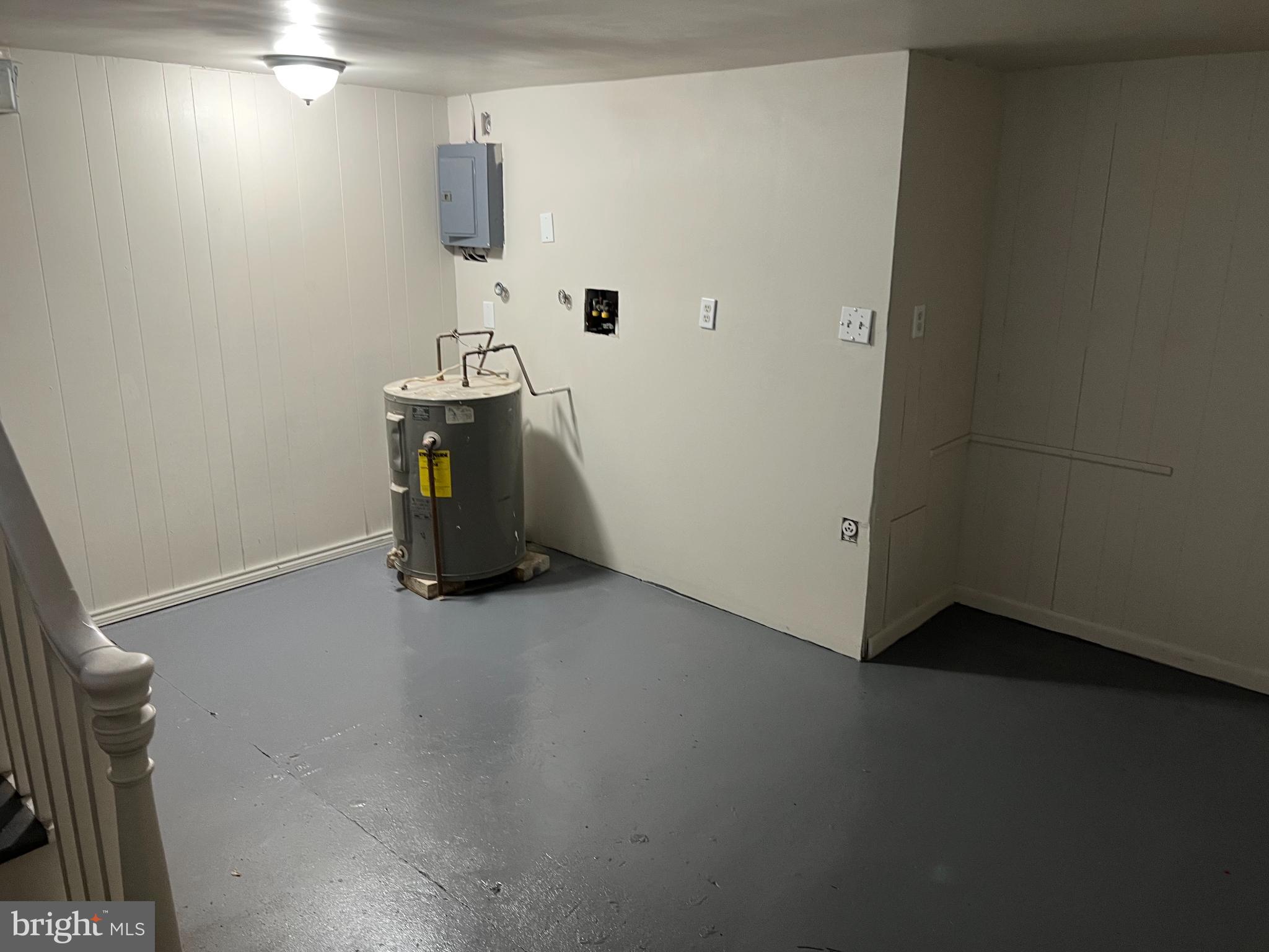 105 Atlantic Street, Unit F1 Bridgeton, NJ 08302 - Photo 9 of 9 a view of a storage & utility room with a window