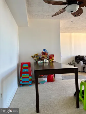 a bedroom with a bed and dresser