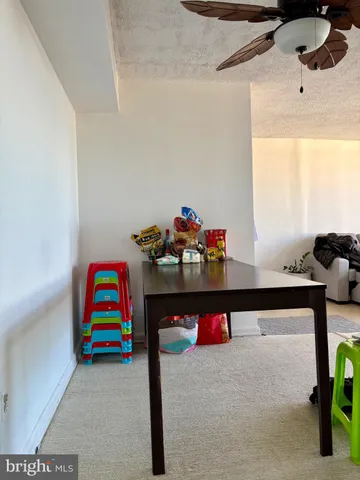 a bedroom with a bed and dresser