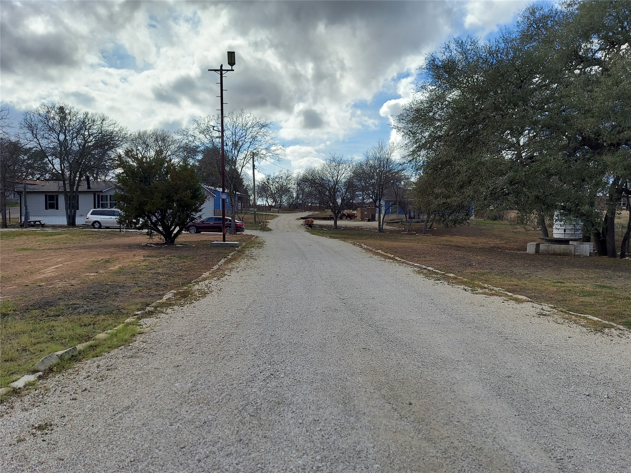 20202 McShepherd Road Georgetown, TX 78626 - Photo 3 of 40 View of dirt / gravel road