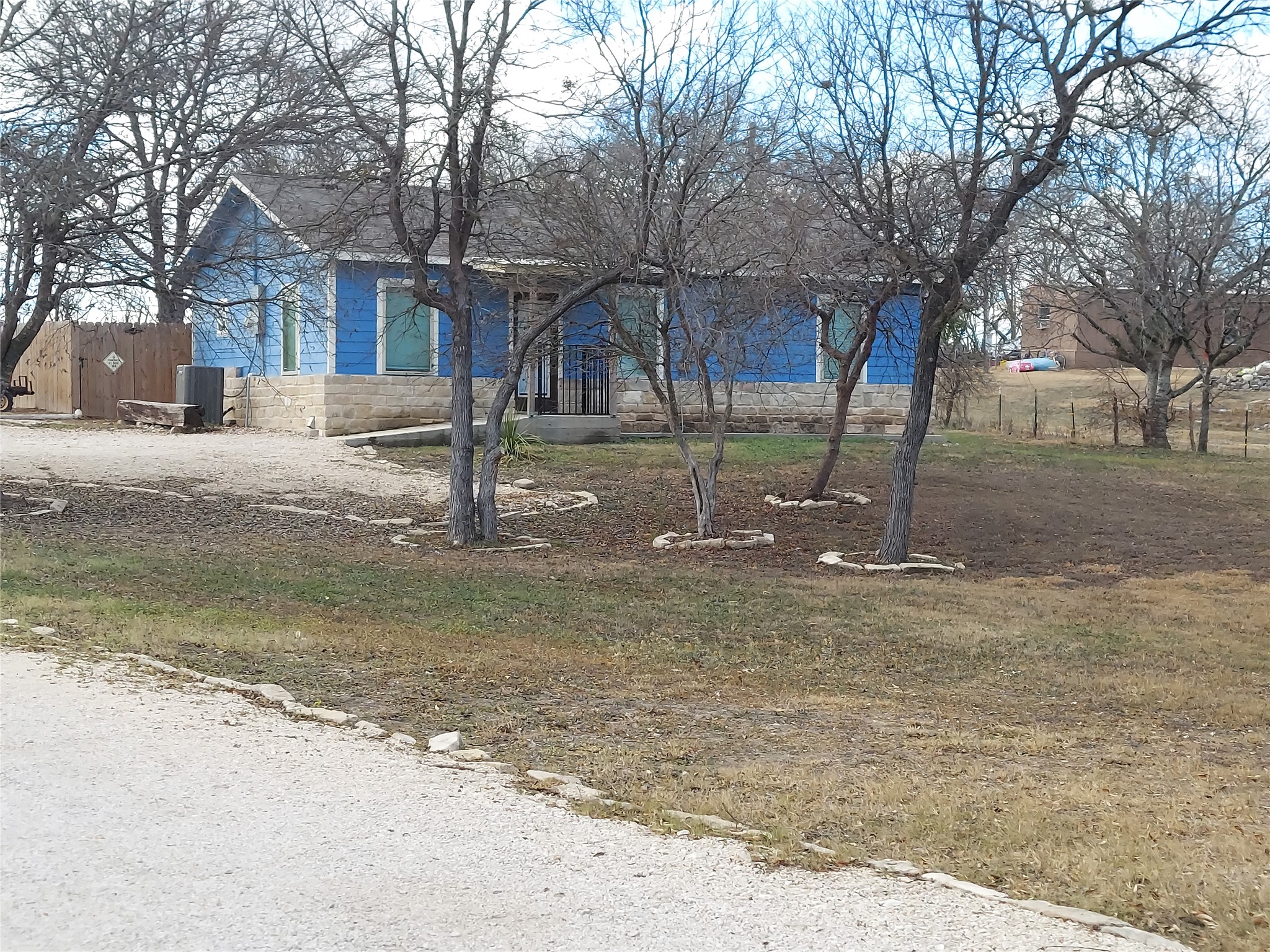 20202 McShepherd Road Georgetown, TX 78626 - Photo 4 of 40 View of front of property featuring stone siding