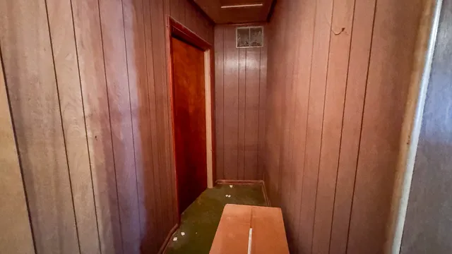 a view of a room with windows