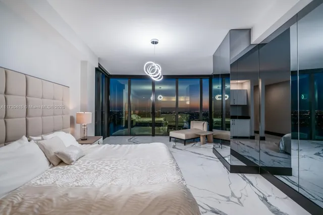 a kitchen with stainless steel appliances a sink and cabinets