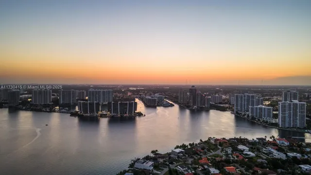 a view of a lake with city