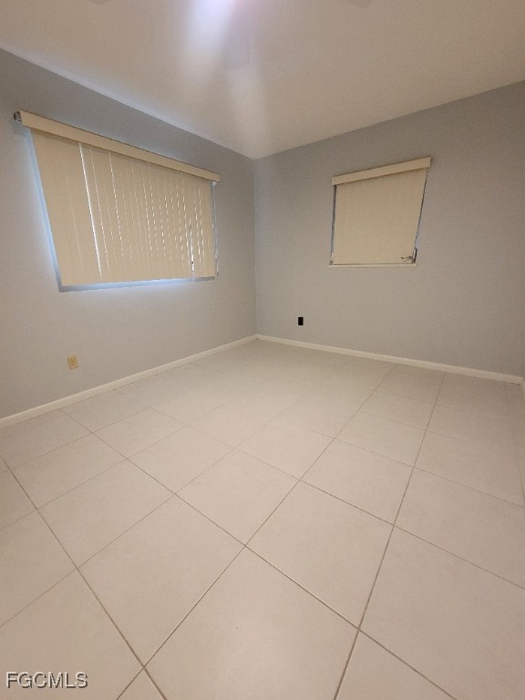 45 Tangelo Court Lehigh Acres, FL 33936 - Photo 16 of 19 a view of an empty room with a window