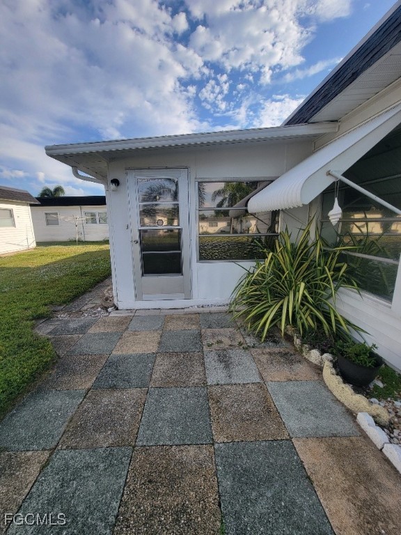 45 Tangelo Court Lehigh Acres, FL 33936 - Photo 19 of 19 a view of a car garage