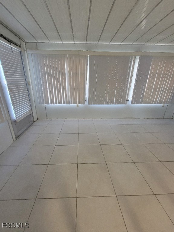 45 Tangelo Court Lehigh Acres, FL 33936 - Photo 9 of 19 a view of an empty room and a window