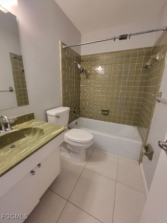 45 Tangelo Court Lehigh Acres, FL 33936 - Photo 10 of 19 a bathroom with a granite countertop sink a toilet and shower