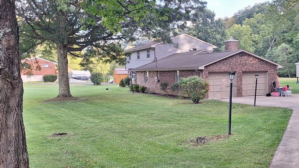 808 Lone Pine Road Amity, PA 15311 - Photo 3 of 38 a house that is sitting in the grass