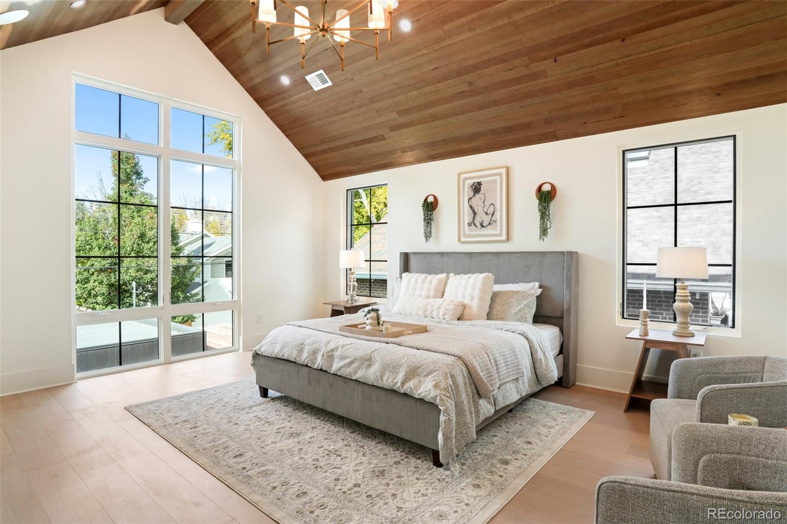 547 South Williams Street Denver, CO 80209 - Photo 23 of 50 a bedroom with a large bed and a large window