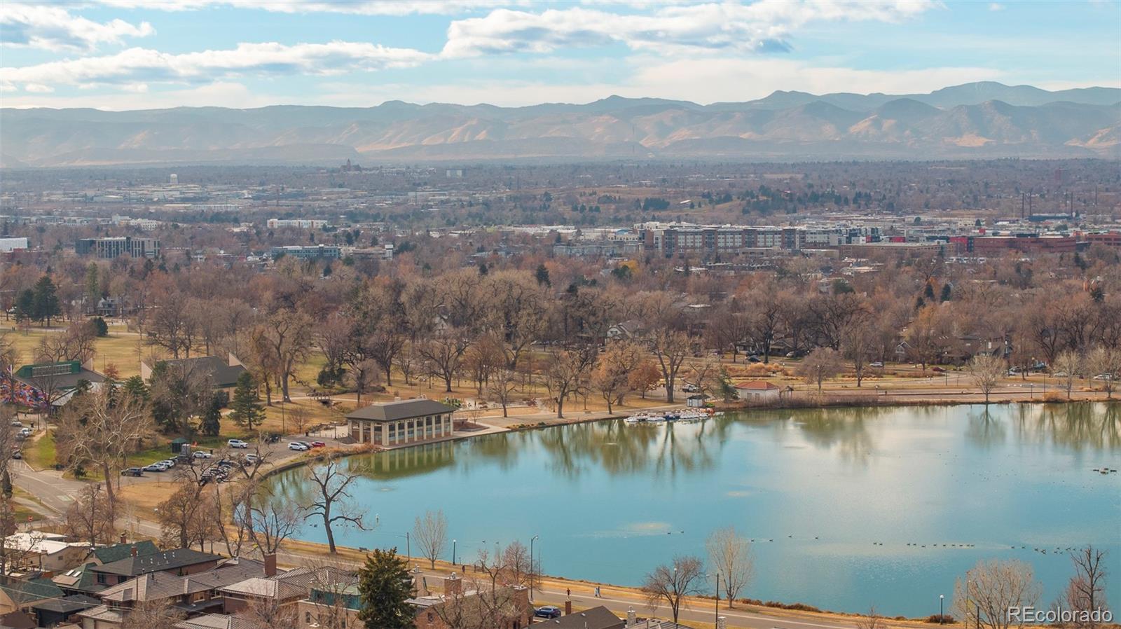 547 South Williams Street Denver, CO 80209 - Photo 49 of 50 a view of a lake with mountains in the background