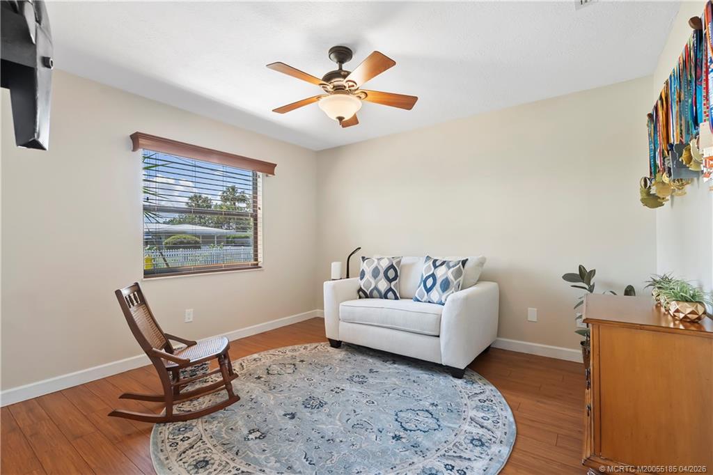 4620 Southeast Quail Trail Stuart, FL 34997 - Photo 24 of 71 a living room with furniture and a window