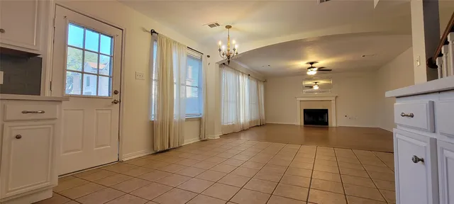 a view of kitchen with furniture and wooden floor