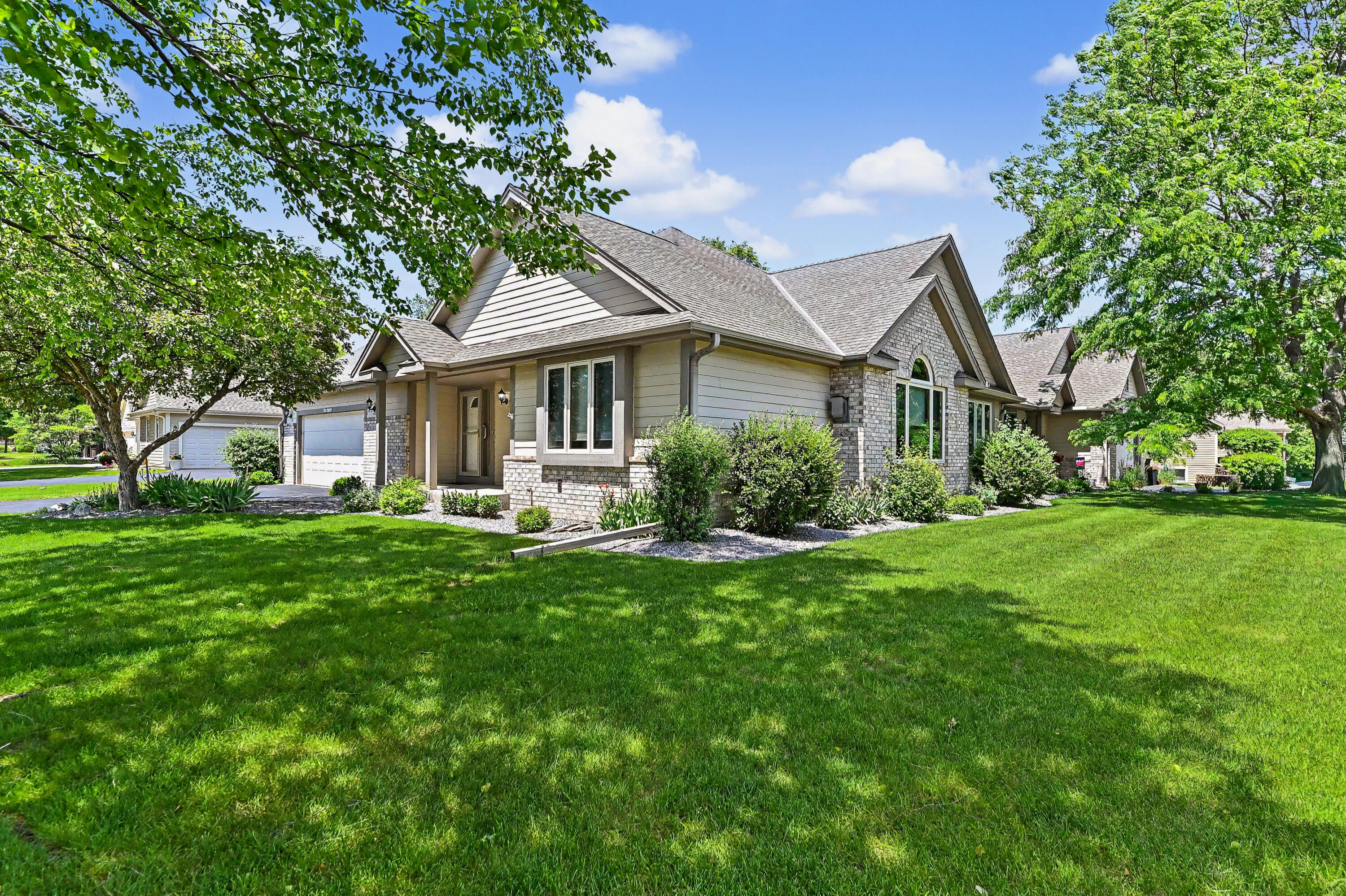 N22-w26492 Shooting Star Road, Unit 2 Pewaukee, WI 53072 - Photo 1 of 32 Mature Corner Lot