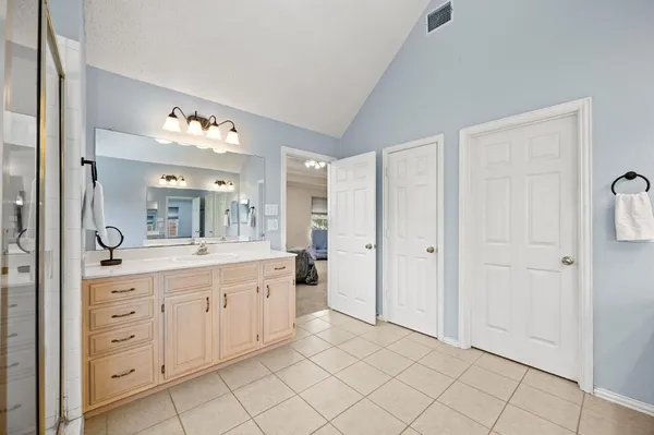 a bathroom with a sink toilet and vanity